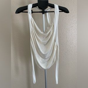 Y2K Wet seal open back halter tie back gold shimmer top. Size medium.